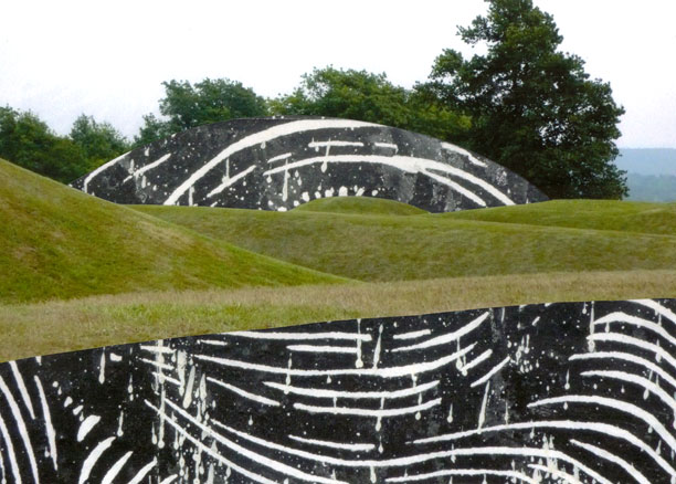Green rolling hills with arching lines of black and white graffiti