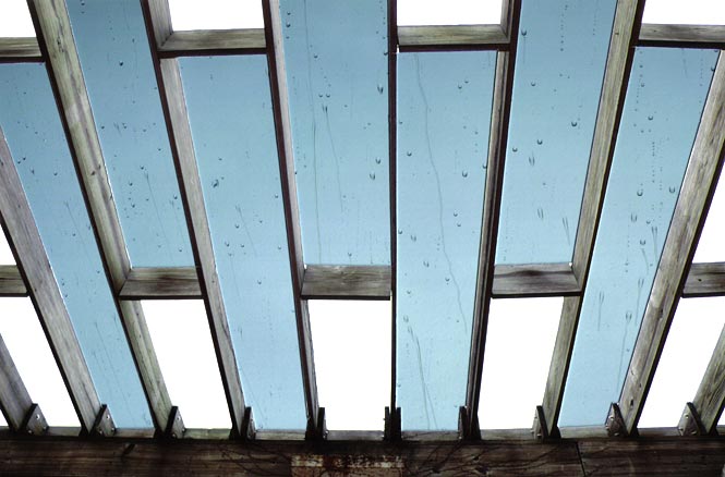 Drops on glass with wood beams